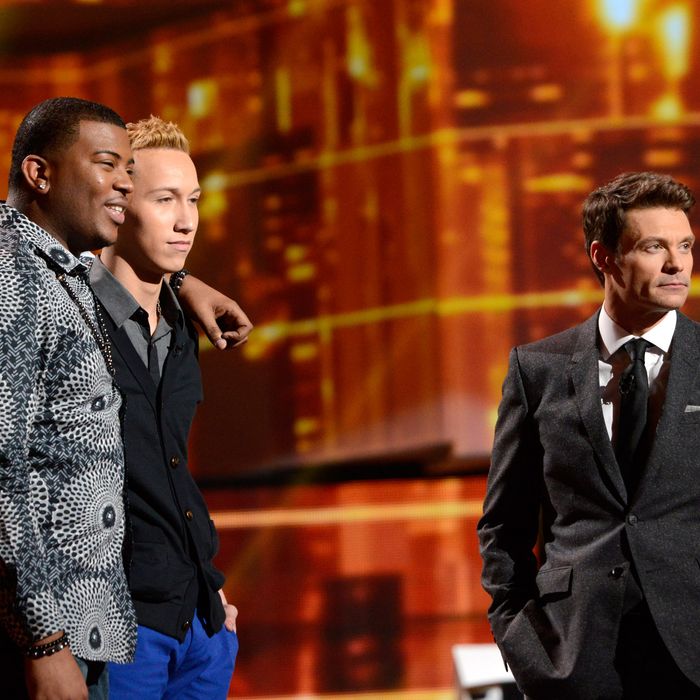 AMERICAN IDOL: Curtis Finch, Jr. (L), Devin Velez (C) and Ryan Seacrest (R) wait to see who will be eliminated on AMERICAN IDOL Thursday, March 14 (8:00-9:00PM ET/PT)
