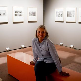 In this Sept. 9, 2011 photo, Associated Press photographer Anja Niedringhaus poses for photographers following a news conference for the opening of her exhibition at the C/O Berlin museum in Berlin. Niedringhaus, 48, an internationally acclaimed German photographer, was killed and an AP reporter was wounded on Friday, April 4, 2014 when an Afghan policeman opened fire while they were sitting in their car in eastern Afghanistan. (AP Photo/David Azia)