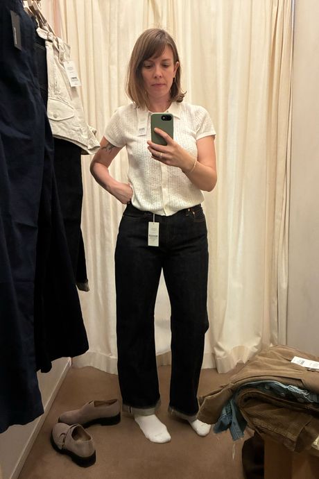 Strategist senior writer Liza Corsillo trying on Buck Mason's Japanese Loomstate Selvedge denim.