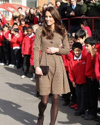 Catherine, Duchess of Cambridge meets children as she leaves Rose Hill Primary School during a visit to Oxford on February 21, 2012 in Oxford, England. The visit is in association with the charity Art Room who work with children to increase self-confidence and self-esteem.