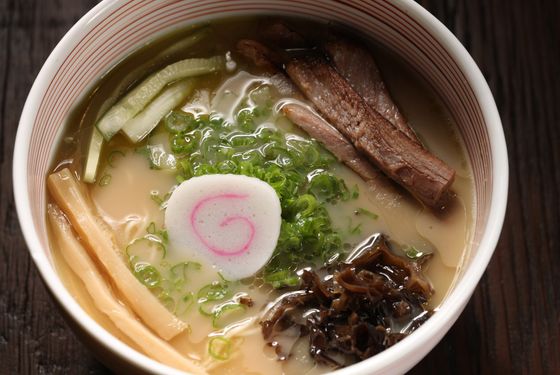 Mu Ramen: oxtail-and-bone-marrow-based soup, brisket, half sour pickle, menma, and cabbage.