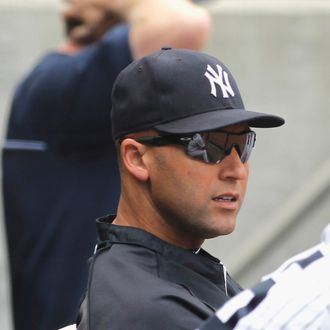 Captain Derek Jeter #2 of the New York Yankees looks on from the dugout during ther game against the Boston Red Sox at Yankee Stadium on September 8, 2013 in the Bronx borough of New York City. 