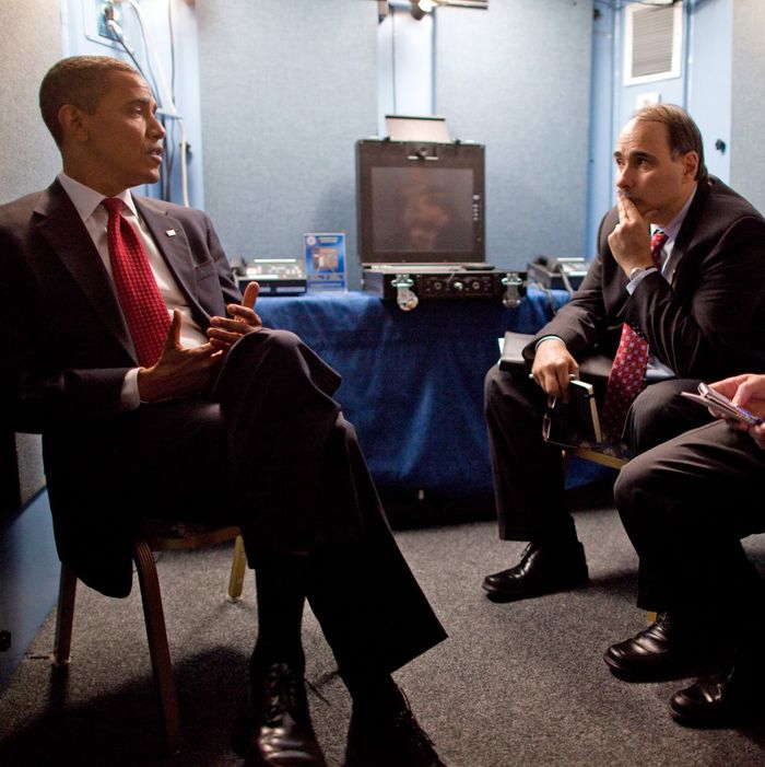 President Barack Obama confers with Senior Advisor David Axelrod and Press Secretary Robert Gibbs at their hotel in Moscow, Russia, July 6, 2009. (Official White House Photo by Pete Souza)This official White House photograph is being made available for publication by news organizations and/or for personal use printing by the subject(s) of the photograph. The photograph may not be manipulated in any way or used in materials, advertisements, products, or promotions that in any way suggest approval or endorsement of the President, the First Family, or the White House.