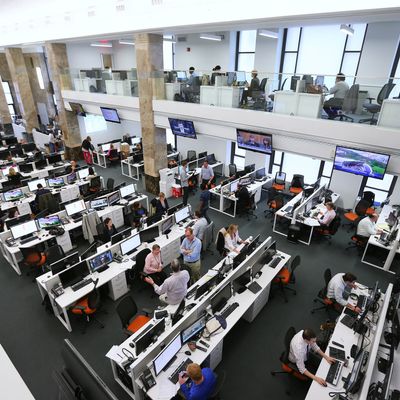 Al Jazeera America employees in the network's offices in New York, May 24, 2013. To counter skepticism about its Al Jazeera America cable channel, the Qatar-based network is building a sizable news organization to cover the U.S. (Chang W. Lee/The New York Times)