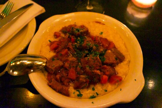 Saffron Risotto With Osso Bucco
Beretta, San Francisco
1199 Valencia Street
415.695.1199; $15
One of the best dishes of risotto we tried, complimented by one of Beretta's excellent cocktails, was this bowl of saffron risotto topped with a rich almost-ragu of veal osso bucco. Risotto purists might balk at all that distraction on top, but this risotto, cooked perfectly al dente and beautifully creamy, is made all the heartier with the addition of the meat, and we probably wouldn't call ourselves purists with regard to anything.