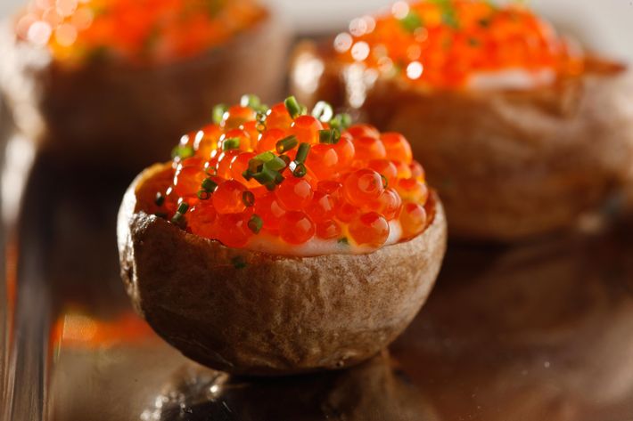 Mini double-baked potatoes with caviar.