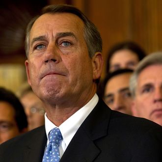 WASHINGTON, DC - DECEMBER 20: Flanked by House GOP members, U.S. Speaker of the House Rep. John Boehner (R-OH) (C), House Majority Leader Rep. Eric Cantor (R-VA) (L) and House Majority Whip Rep. Kevin McCarthy (R-CA) listen during a media availability December 20, 2011 on Capitol Hill in Washington, DC. The House rejected the version of the bi-partisan two-month payroll tax cut extension that was approved by a majority of the Senate on December 17. (Photo by Alex Wong/Getty Images)