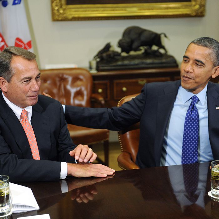 U.S. President Barack Obama (R) sits with Speaker of the House John Boehner (R-OH) during a meeting with bipartisan group of congressional leaders in the Roosevelt Room of the White House on November 16, 2012 in Washington, DC. Obama and congressional leaders of both parties are meeting to reportedly discuss deficit reduction before the tax increases and automatic spending cuts go into affect in the new year.