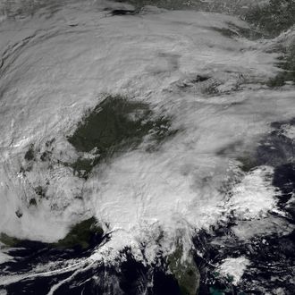 This image made available by NOAA shows storm systems over the eastern half of the United States on Thursday, Feb. 7, 2013 at 11:15 EST. A blizzard of potentially historic proportions threatened to strike the Northeast with a vengeance Friday, Feb. 8, 2013 with 1 to 2 feet of snow feared along the densely populated Interstate 95 corridor from the New York City area to Boston and beyond. (AP Photo/NOAA)