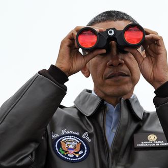 US President Barack Obama looks through binoculars towards North Korea from Observation Post Ouellette during a visit to the Joint Security Area of the Demilitarized Zone (DMZ) near Panmunjom on the border between North and South Korea on March 25, 2012. Obama arrived in Seoul earlier in the day to attend the 2012 Seoul Nuclear Security Summit to be held on March 26-27. AFP PHOTO / Jewel Samad (Photo credit should read JEWEL SAMAD/AFP/Getty Images)