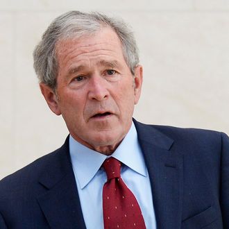 DALLAS, TX - APRIL 24: Former President George W. Bush participates in a signing ceremony inside the Freedom Hall for the joint use agreement between the National Archive and the George W. Bush Presidential Center on the campus of Southern Methodist University on April 24, 2013 in Dallas, Texas. Dedication of the George W. Bush Presidential Library is to take place on April 25 with all five living U.S. Presidents in attendance. (Photo by Kevork Djansezian/Getty Images)