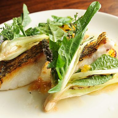 Black sea bass, pickled green tomatoes, cardamom, vanilla and dandelion