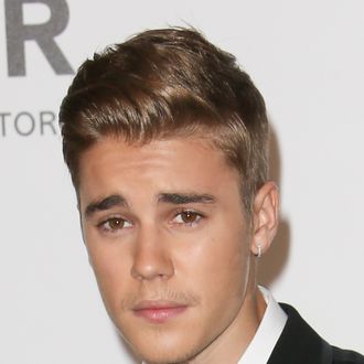 CAP D'ANTIBES, FRANCE - MAY 22: Justin Bieber attends amfAR's 21st Cinema Against AIDS Gala, Presented By WORLDVIEW, BOLD FILMS, And BVLGARI at the 67th Annual Cannes Film Festival on May 22, 2014 in Cap d'Antibes, France. (Photo by Tony Barson/FilmMagic)