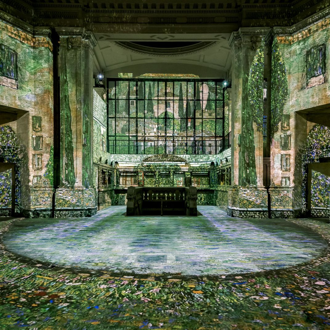 The Beaux-Arts interior stands in for Vienna.