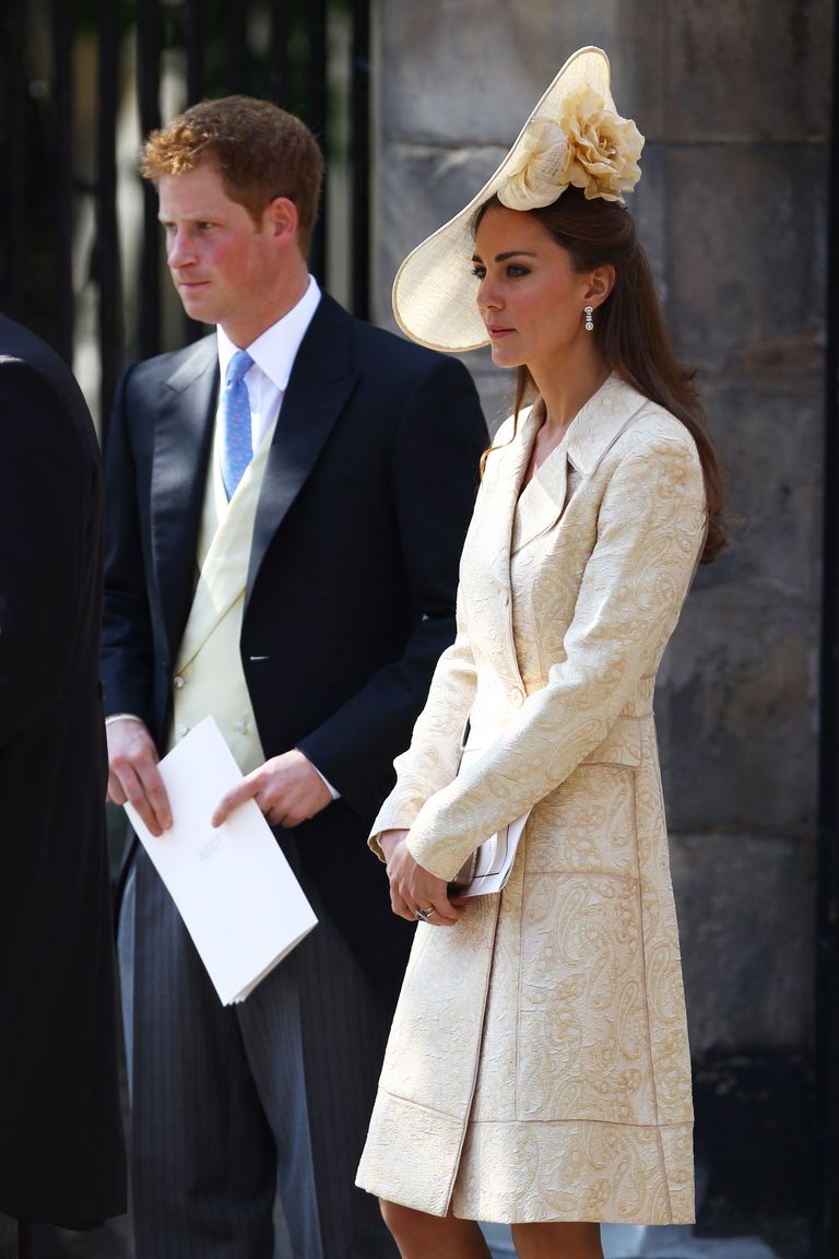 EDINBURGH, SCOTLAND - JULY 30:  Prince Harry and Catherine, Duchess of Cambridge depart after the Royal wedding of Zara Phillips and Mike Tindall at Canongate Kirk on July 30, 2011 in Edinburgh, Scotland. The Queen’s granddaughter Zara Phillips will marry England rugby player Mike Tindall today at Canongate Kirk. Many royals are expected to attend including the Duke and Duchess of Cambridge.  (Photo by Jeff J Mitchell/Getty Images)