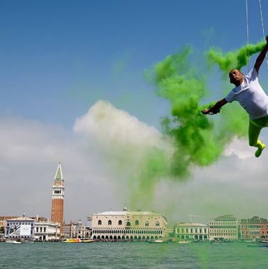 On May 28, Chinese artist Li Wei performed above the water in front of St. Mark’s, apparently propelled by jets of green smoke.
