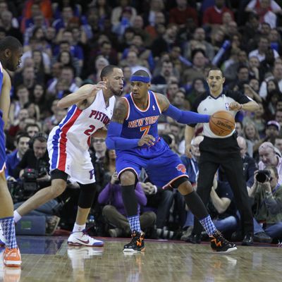 Carmelo Anthony #7 of the New York Knicks posts up Tayshaun Prince #22 of the Detroit Pistons during a game between the New York Knicks and the Detroit Pistons at the 02 Arena on January 17, 2013 in London, England.