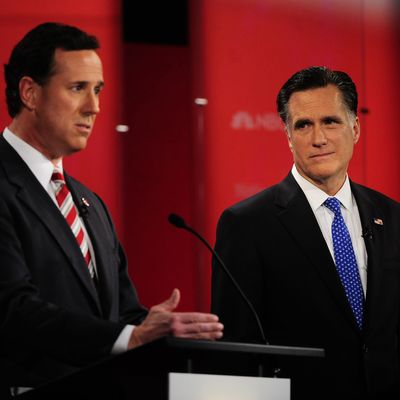 Republican presidential hopefuls Rick Santorum and Mitt Romney take part in The Republican Presidential Debate at University of South Florida in Tampa, Florida, January 23, 2012