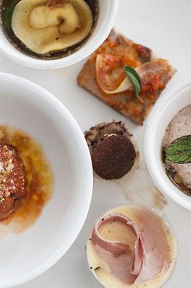 The winning plate from Missy Robbins consisting of testa (pig's head), fegato (liver), proscuitto cotto (ham and eggs), polpetti (ricotta stuffed meatballs), tortelli (bacon filled pasta), and stufato (feet and skin).