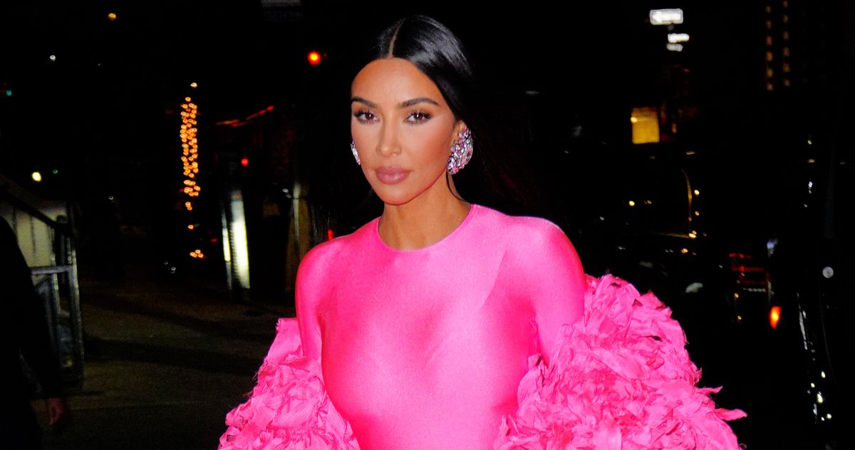 Kim Kardashian looks incredible in skintight yellow vintage