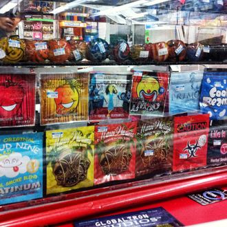 Synthetic marijuana, sold in colorful packages with names like Cloud Nine, Maui Wowie and Mr. Nice Guy, sits behind the glass counter at a Kwik Stop in Hollywood, Florida. Police are beginning to crack down on synthetic drugs.