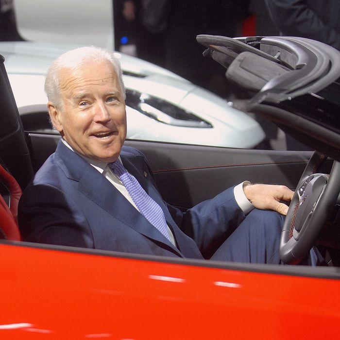 U.S. Vice-President Joe Biden sits in a Corvette at the North American International Auto Show industry preview at Cobo Hall on January 16, 2014 in Detroit, Michigan. 