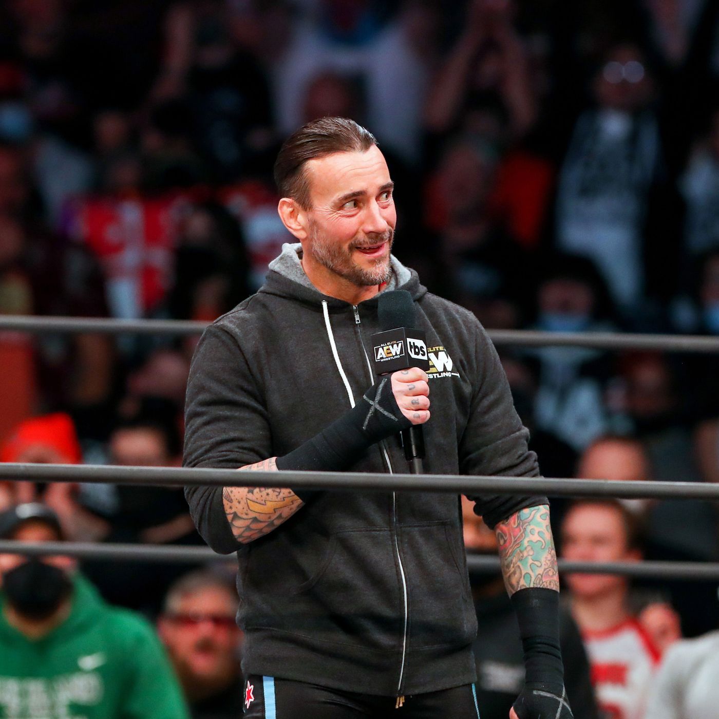 Backstage News on How CM Punk Was Received at WWE Monday Night Raw - Men's  Journal