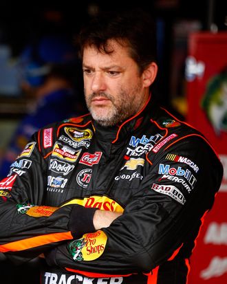 RICHMOND, VA - SEPTEMBER 05: Tony Stewart, driver of the #14 Bass Pro Shops/Mobil 1 Chevrolet, looks on in the garage area during practice for the NASCAR Sprint Cup Series Federated Auto Parts 400 at Richmond International Raceway on September 5, 2014 in Richmond, Virginia. (Photo by Jared Wickerham/Getty Images)