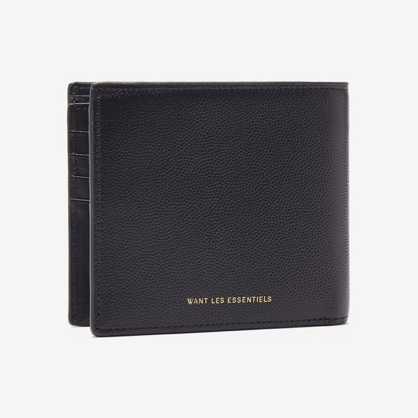 Want Les Essentiels Benin Bi-Fold Wallet a pocket sized thin black leather bi-fold wallet with a minimalist Want Les Essentials logo embossed in gold. The Strategist - 48 Things on Sale You’ll Actually Want to Buy: From Sunday Riley to Patagonia