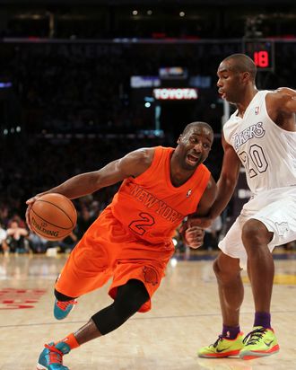 Raymond Felton #2 of the New York Knicks dribbles to the basket against Jodie Meeks #20 of the Los Angeles Lakers in the second half during the NBA game at Staples Center on December 25, 2012 in Los Angeles, California. The Lakers defeated the Knicks 100-94. 