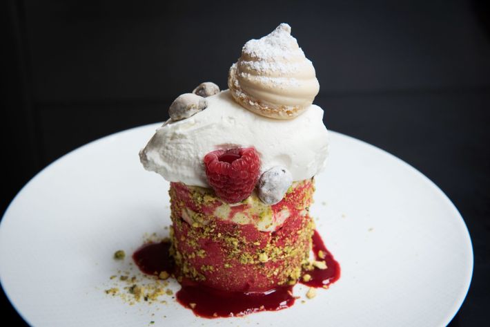 Vanilla raspberry vacherin, made with baked meringue, Chantilly, and ice cream.