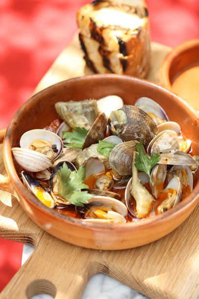 Manila clams and chorizo steamed in the wood oven