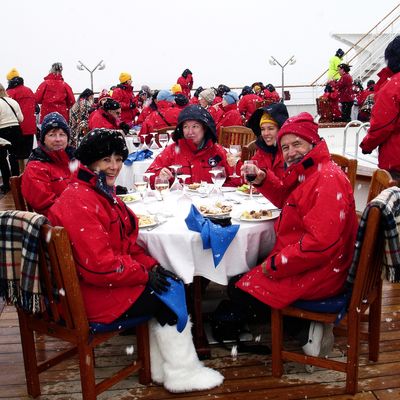Tourists dining on deck of Explorer II