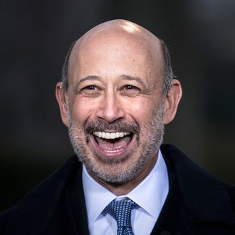 Lloyd Blankfein, Chairman and CEO of Goldman Sachs Group, laughs during an interview after a meeting with other business leaders at the White House on February 5, 2013 in Washington. Obama met with business and labor leaders to discuss immigration reform. 