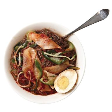 This 24-hour Korean spot is the Queens go-to for chewy arrowroot noodles and fresh vegetables in a frozen broth that, as it melts, releases a spicy-chile heat. Let your waiter snip the noodles with scissors, or you’ll be slurping three-foot-long beasts. $11; 156-03 Northern Blvd., Murray Hill; 718-461-6511.