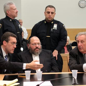 Prominent Orthodox leader Nechemya Weberman (center) at State Supreme Court in Brooklyn after being found guilty of 59 counts of sexual abuse. The conviction of a prominent member of Brooklyn’s Satmar Hasidic community on 59 counts of sexually abusing a schoolgirl stands as an important use of the criminal law in a defiantly insular culture. A jury credited her description of Weberman as a predator, and it rejected his claim that she had accused him in revenge for a scheme to have her boyfriend charged with statutory rape. Based on the evidence, the finding appeared a well-justified conclusion for which punishment must, and will, be severe. That said, had the jury acquitted Weberman, the case would still have been a landmark. On its own, trying him established that the law will be equally and fairly applied to all. L-R: Defense Attorney Michael Farkas, Nechemya Weberman, defense attorney George Farkas.