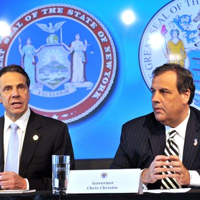 New York Governor Andrew M. Cuomo joins New Jersey Governor Chris Christie in announcing quarantine plans for people entering New York and New Jersey with symptoms of the Ebola virus during a press conference at 7 World Trade Center in New York City October 24, 2014.