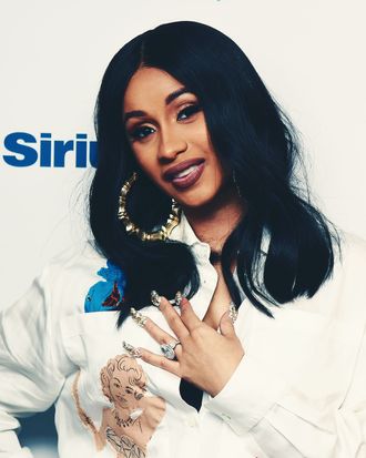 Cardi B reveals insane diamond-encrusted manicure only she could wear |  Metro News