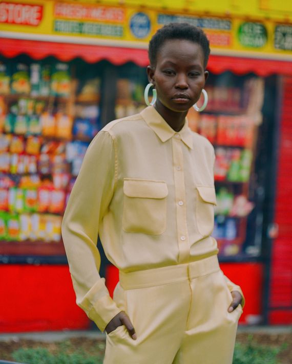 yellow trench coat outfit