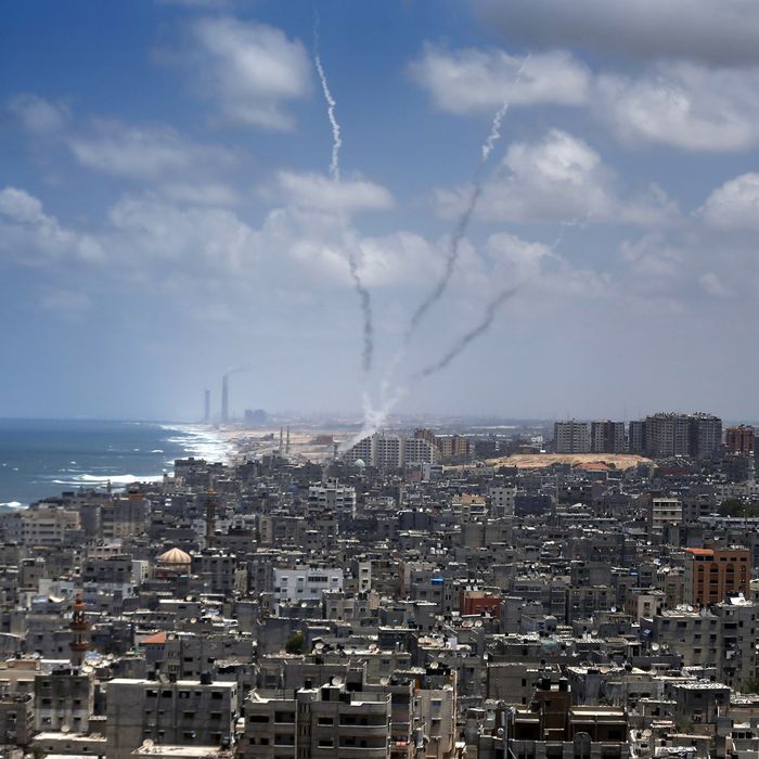 Smoke from rockets fired from Gaza City are seen after being launched toward Israel, on July 15, 2014. US Secretary of State John Kerry warned of the 