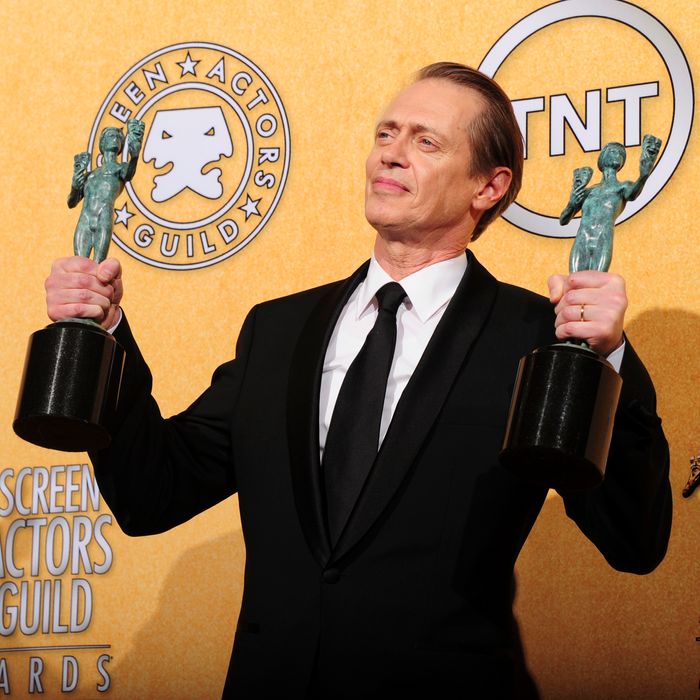 Actor Steve Buscemi holds the award for best actor in a drama series for his role in 'Boardwalk Empire' in the press room at the 18th Annual Screen Actors Guild Awards at the Shrine Auditorium in Los Angeles, California on January 29, 2012. AFP PHOTO / FREDERIC J. BROWN (Photo credit should read FREDERIC J. BROWN/AFP/Getty Images)