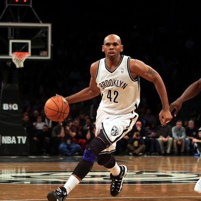 Jerry Stackhouse #42 of the Brooklyn Nets dribbles the ball against the Boston Celtics at the Barclays Center on November 15, 2012 in the Brooklyn borough of New York City.