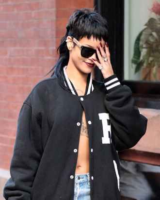 RIHANNA STROLLS INTO SoHo, NEW YORK IN A LACY SEE THROUGH BRA