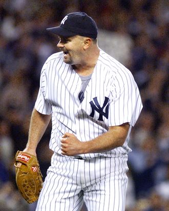 New York Yankee pitcher David Wells pumps his fist in game one of the American League Championship Series against the Cleveland Indians 06 October at Yankee Stadium in New York.