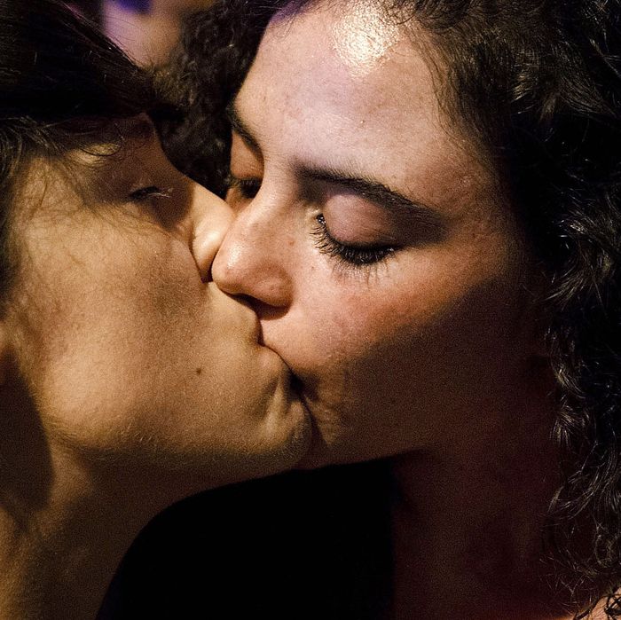 Two women kiss at the Madrid Gay Pride Festival on July 5, 2013.