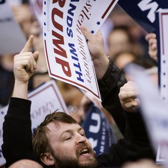 A protester yells during a Trump rally at the International Exposition Center March 12, 2016 in Cleveland, Ohio. Donald Trump is under fire from rivals who blamed his incendiary rhetoric for a violent outbreak Friday between protesters and supporters at the Republican frontrunner's rally in Chicago. 