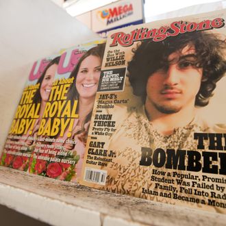 July 17, 2013 - Orange County, California, USA - The August 1, 2013 issue of Rolling Stone Magazine features on the cover a portrait of alleged Boston Bombing suspect Jahar Tsarnaev. The controversial cover, with a 12 page article attributed to Rolling Stone Contributing Editor Janet Reitman, has many in Boston upset at what many have come to expect to be on the cover of the Rolling Stone, a rock star, adding that the photo resembles a September 1981Rolling Stone Cover of the late Jim Morrison.---In the photo a copy of Rolling Stone with the controversial cover on display with other magazines at an Orange County. California Liquor Store. (Credit Image: ? David Bro/ZUMAPRESS.com)