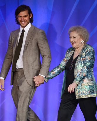 LOS ANGELES, CA - APRIL 20: Actors Alex Pettyfer (L) and Betty White speak onstage at the 24th Annual GLAAD Media Awards presented by Ketel One and Wells Fargo at JW Marriott Los Angeles at L.A. LIVE on April 20, 2013 in Los Angeles, California. (Photo by Kevin Winter/Getty Images for GLAAD)