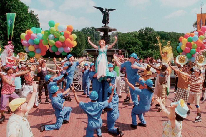 A still of a group dance number from the NYC-set Disney movie 