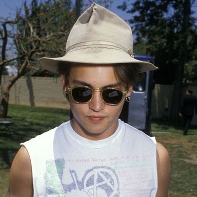 Why wouldn't Johnny Depp show up to the 18th Annual Los Angeles Police/Celebrity Golf Tournament dressed like a bohemian Kate Moss?